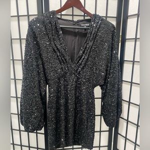 Retrofete black sequined mini dress in size XS deep V cut